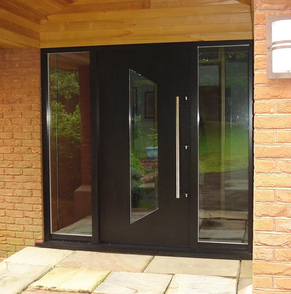 Contemporary aluminium entrance door with glazed side panels