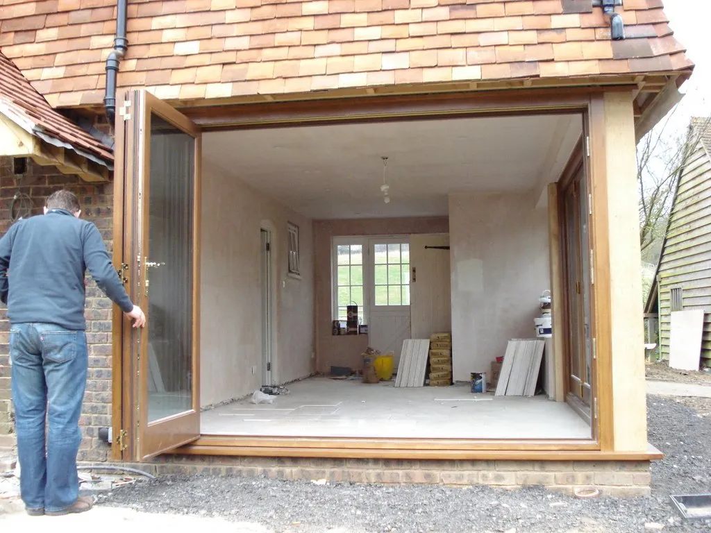 Oak garden room with glazed doors open