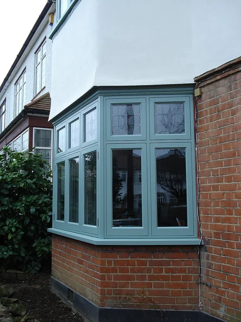 Sage green painted timber bay window